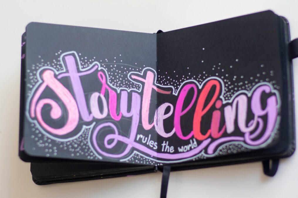 a black rectangular object with pink text