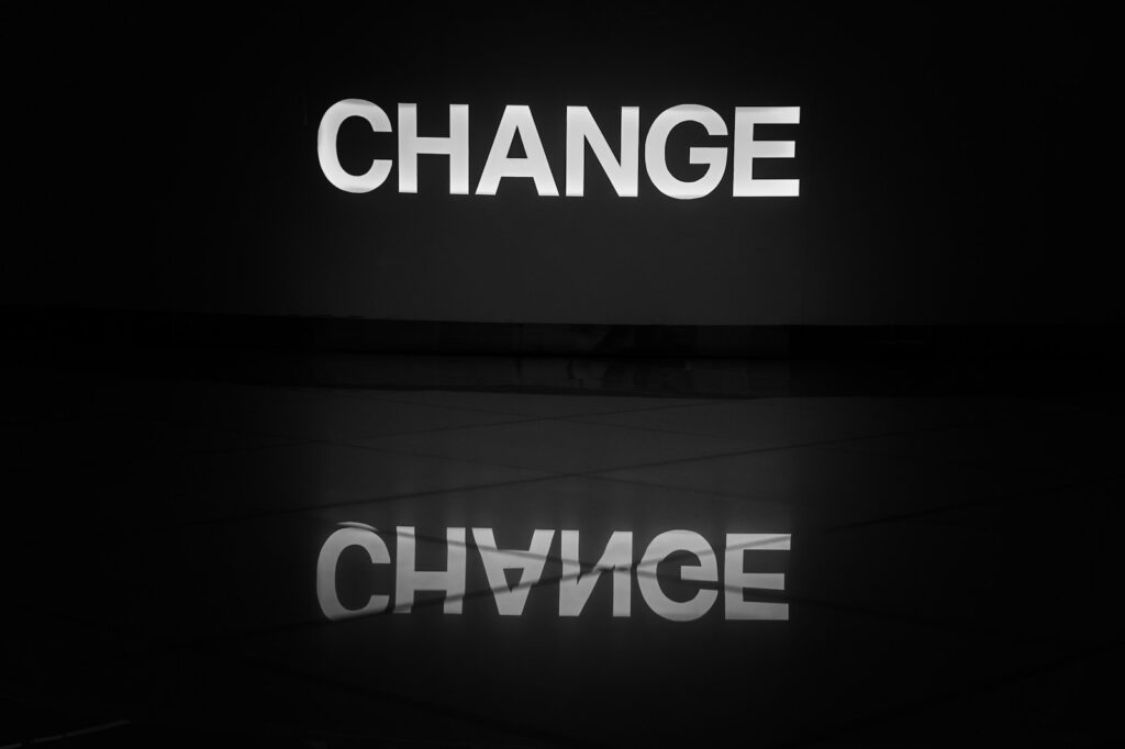 a black and white photo of the word change